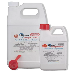 Two bottles of Allersearch Allergen Wash detergent with a smaller bottle and scoop on a white background.