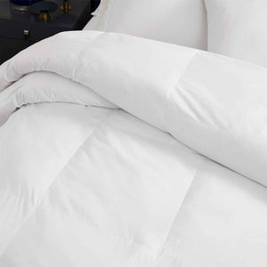 easy-care PrimaLoft® white goose-down alternative comforter.