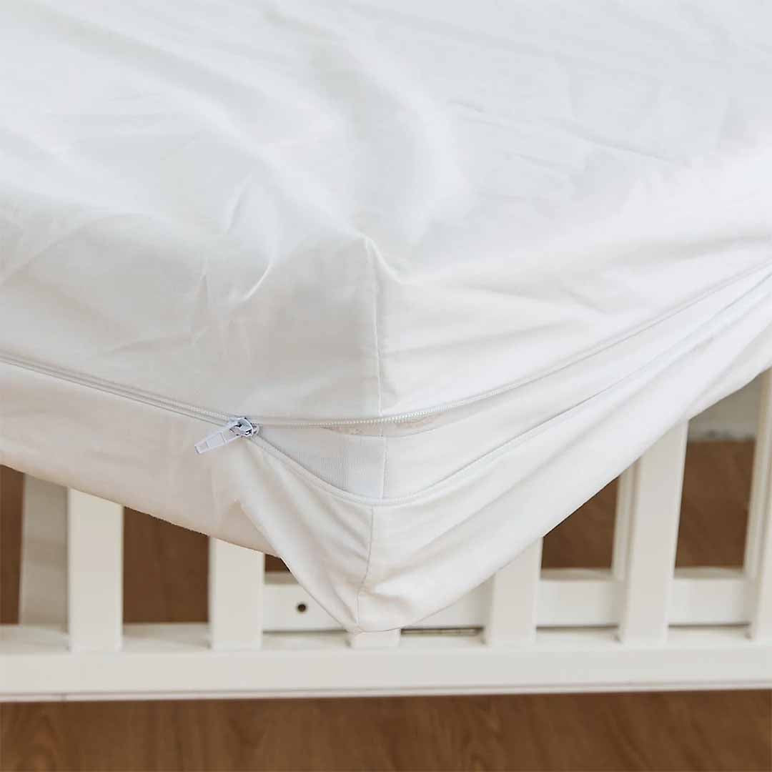 Allergycare cotton crib covers zip closed for complete protection from allergens.