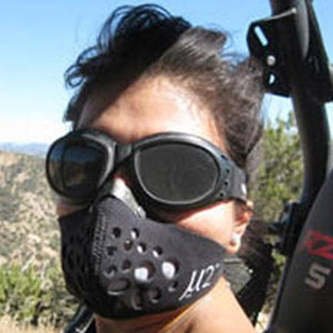 Girl off roading wearing U2 Mask