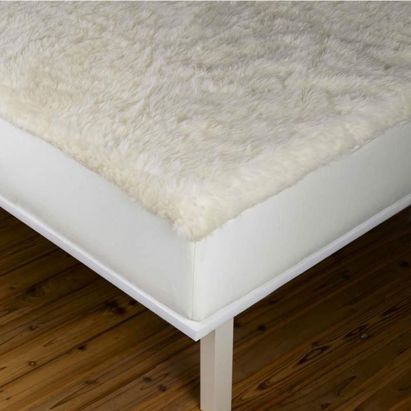 https://allergystore.com/cdn/shop/products/natural-wool-mattress-pad-w_800x800.jpg?v=1668438499